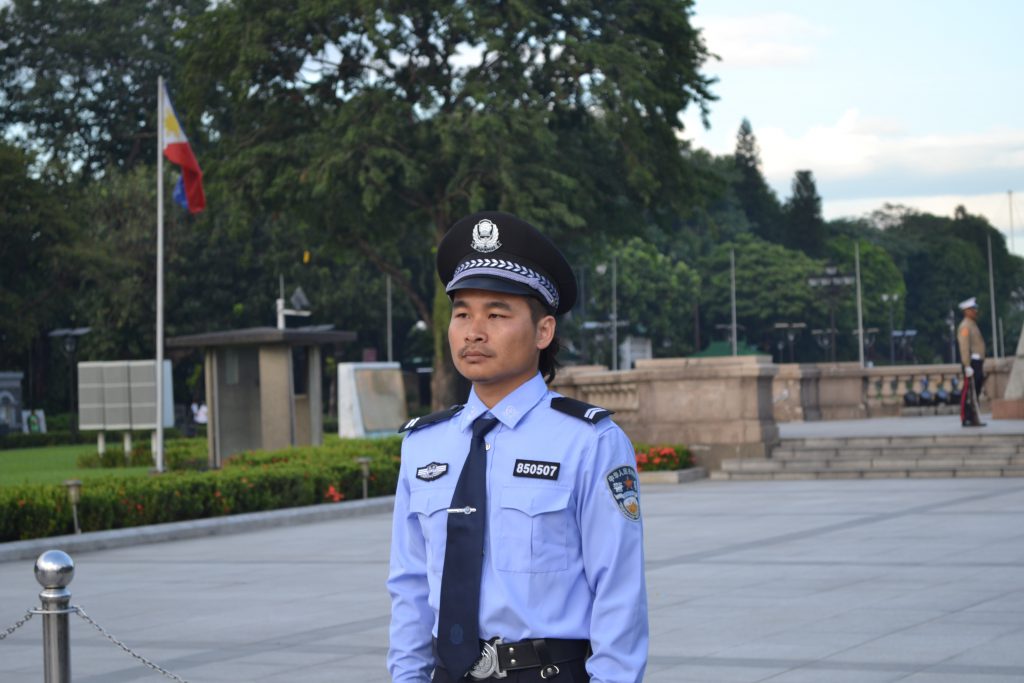Li Binyuan: Standing Guard, 2016, performance. Courtesy the Museum of Contemporary Art and Design in Manila.