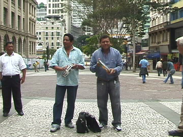 Asking the Repentistas - Peneira & Sonhador - to remix my octopus works, 2006 (Still)